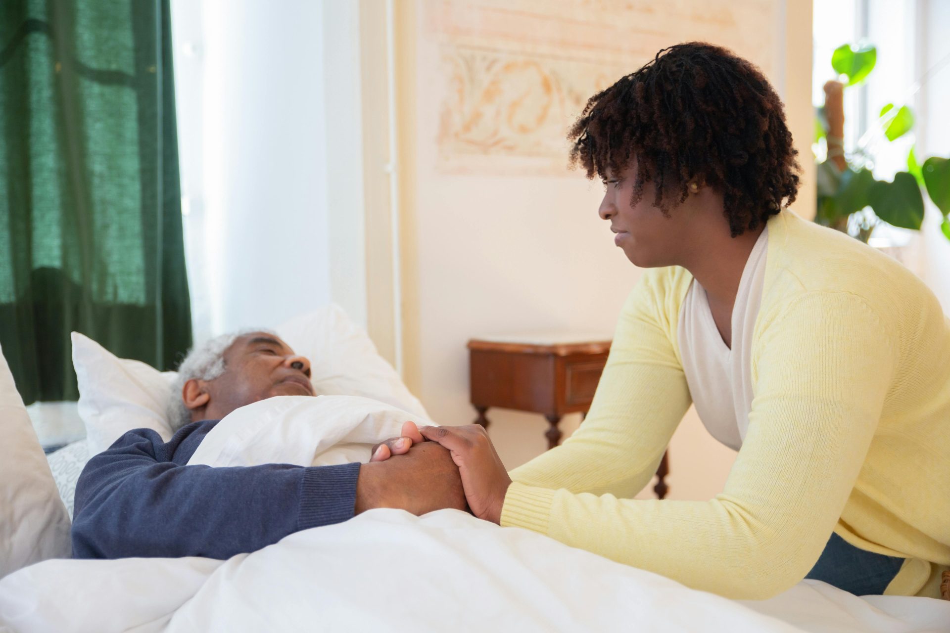 A tender moment showing compassion and care between two people, highlighting relationship and empathy.